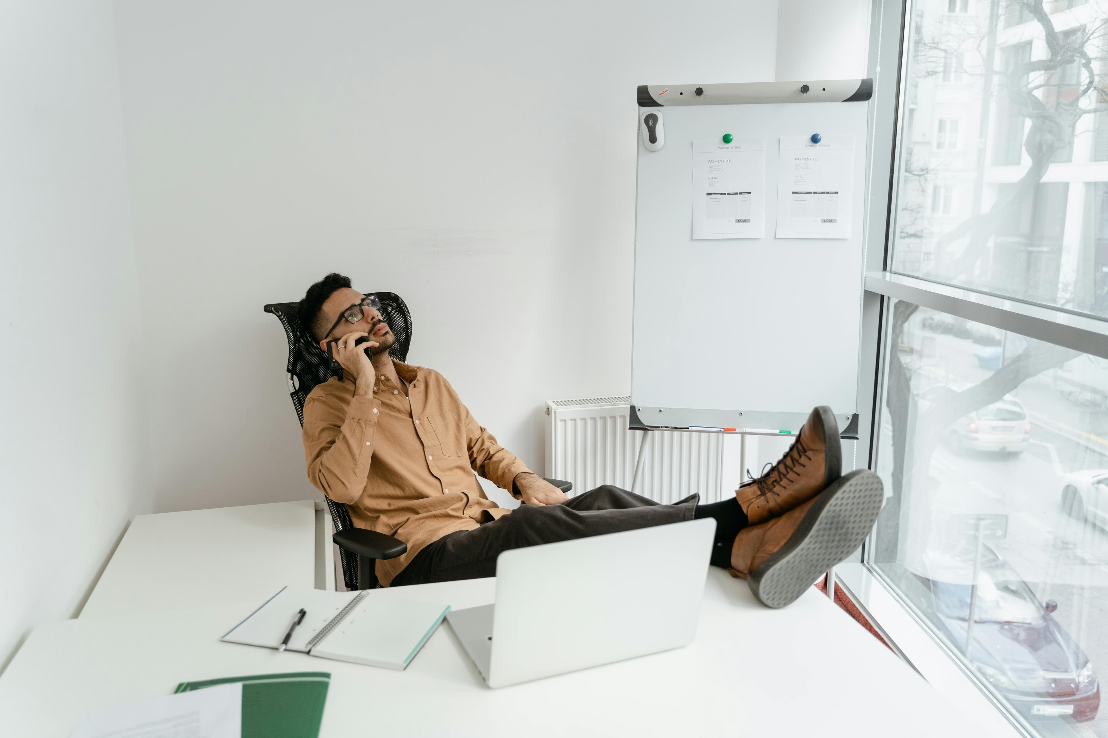 Relaxed business owner with a checkmark symbol